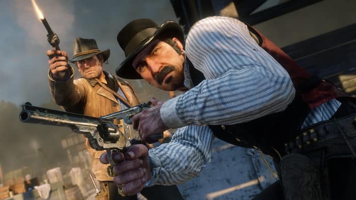 Dutch et Arthur en pleine fusillade dans Red Dead Redemption 2
